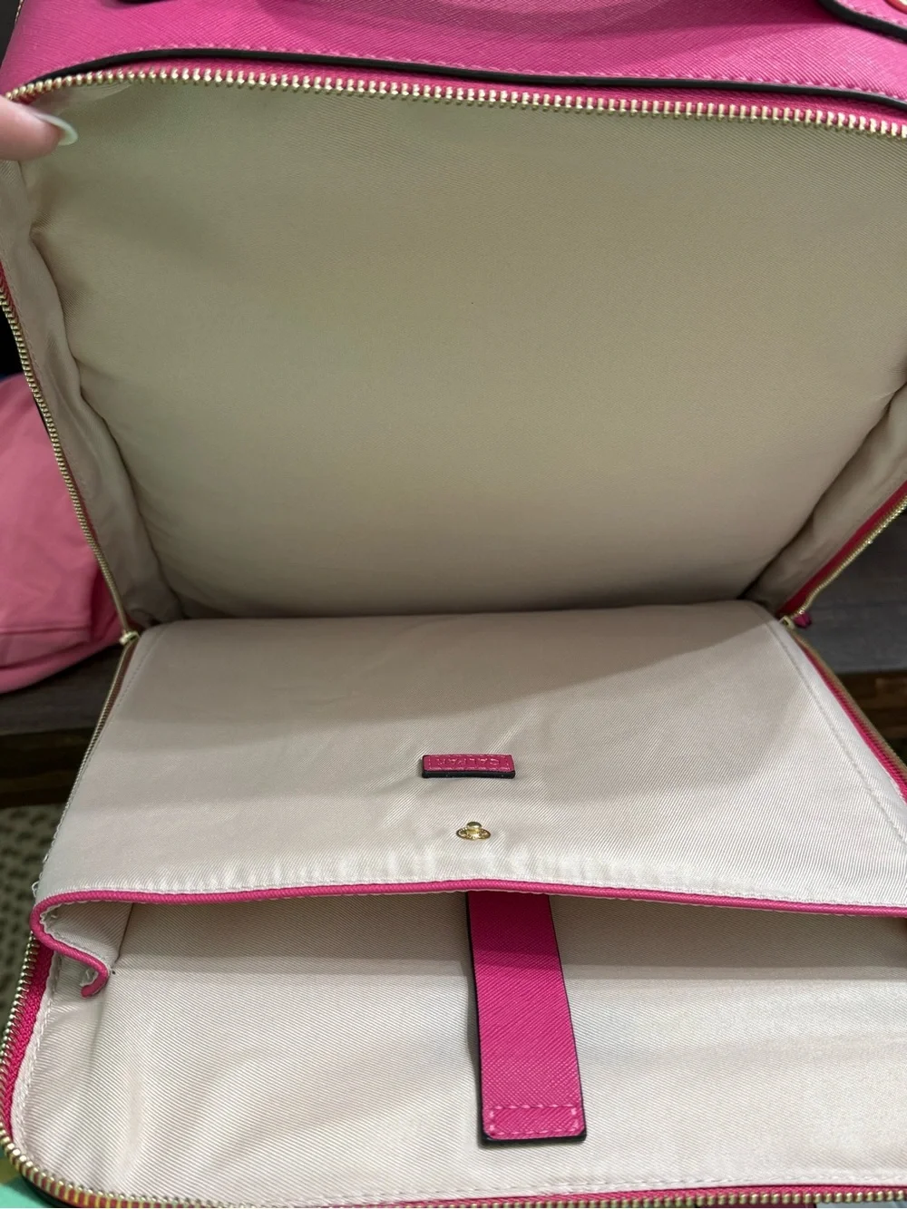 CALPAK Kaya Laptop Backpack in the vibrant Dragonfruit hot pink